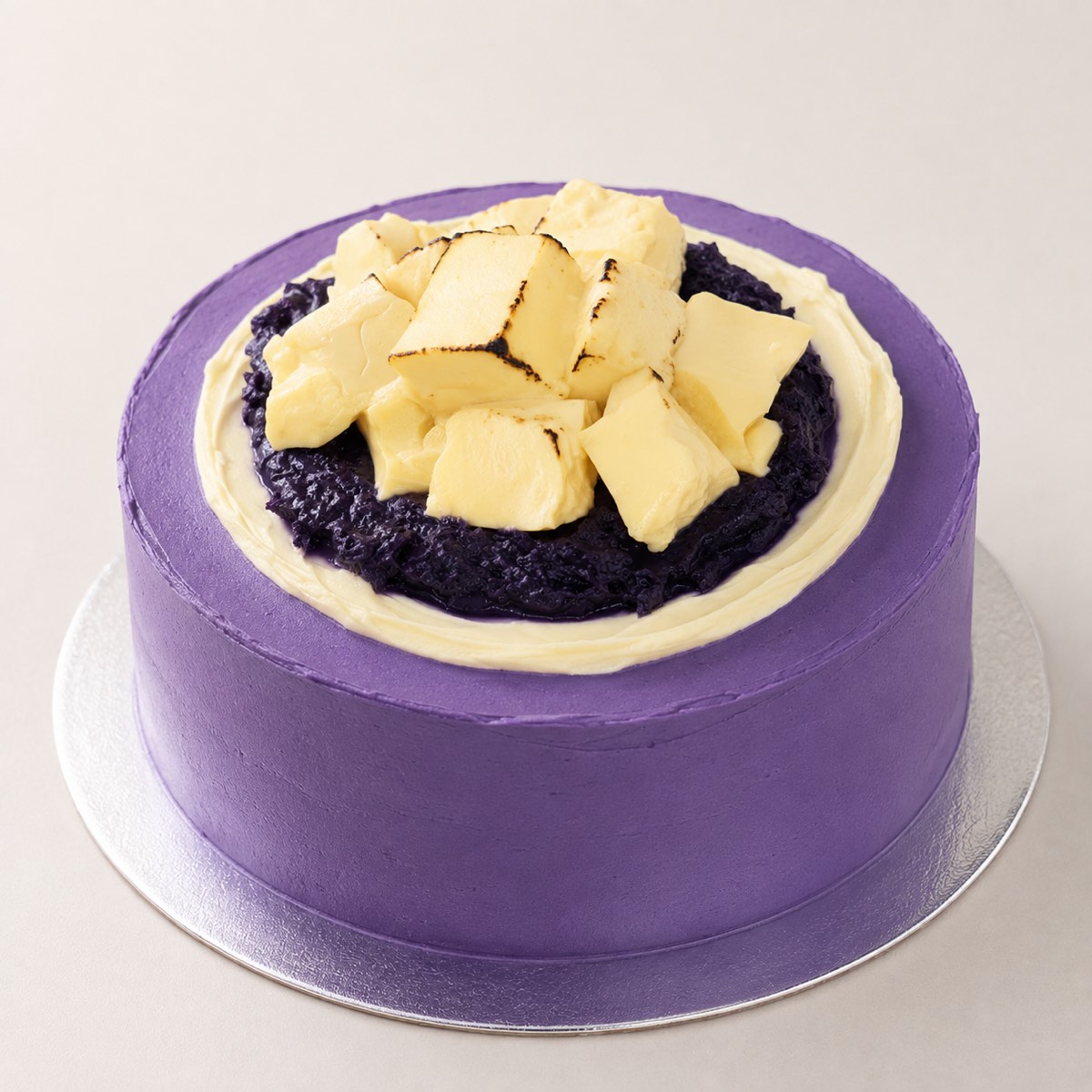 Ube Flan Cake, a purple ube cake topped with cubes of flan
